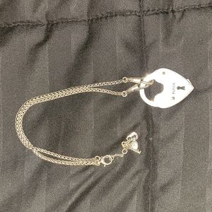 Fossil heart lock necklace